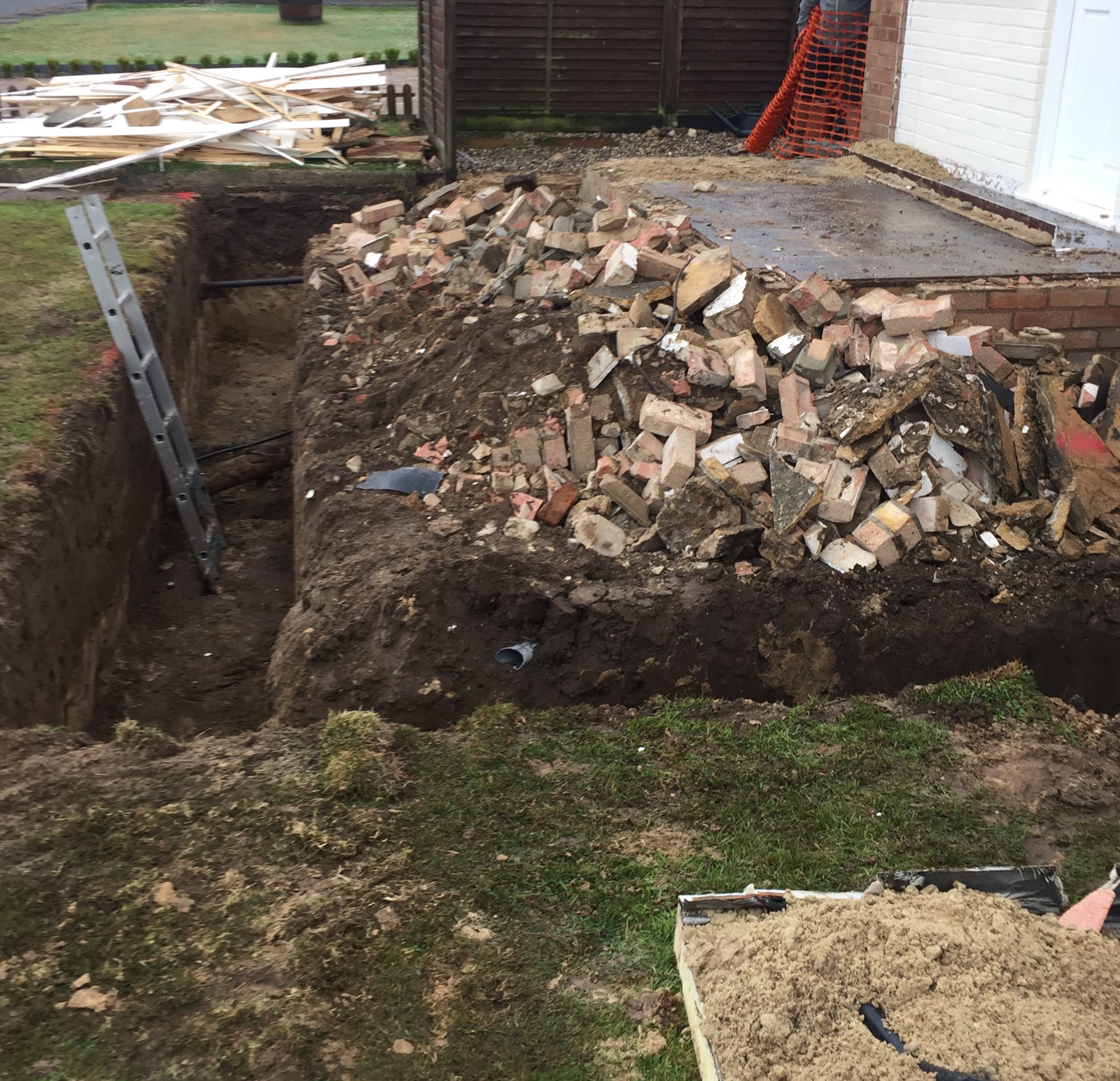 Excavating Foundations for Home Extension