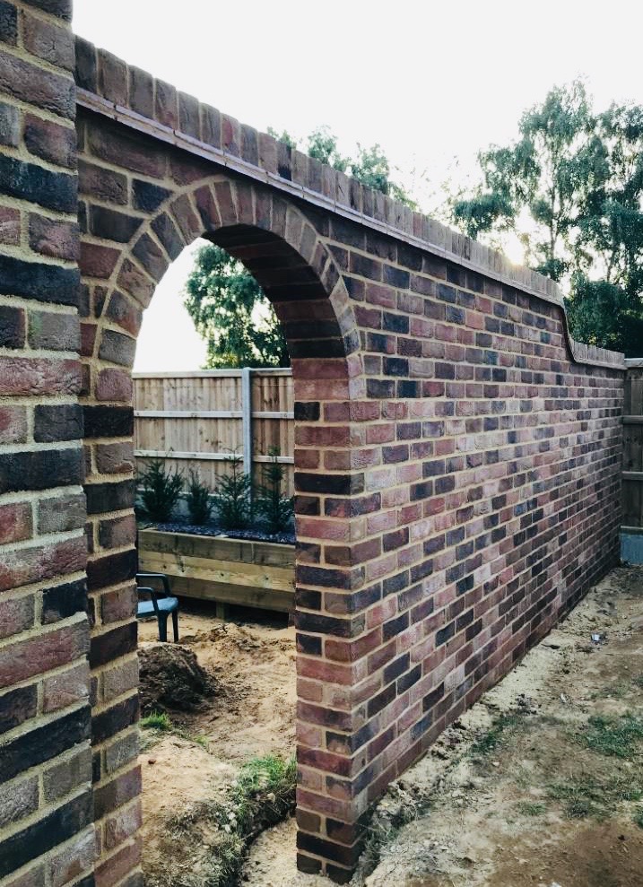 Garden Wall Completed with Arched Brickwork